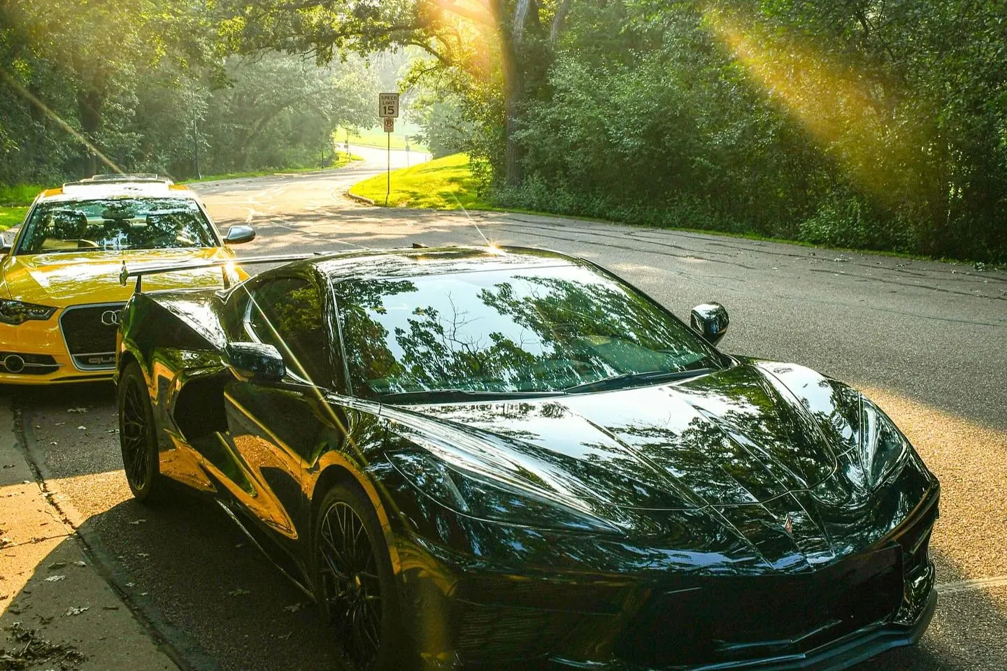 Black C8 Corvette photographed at golden hour in Sioux Falls, South Dakota