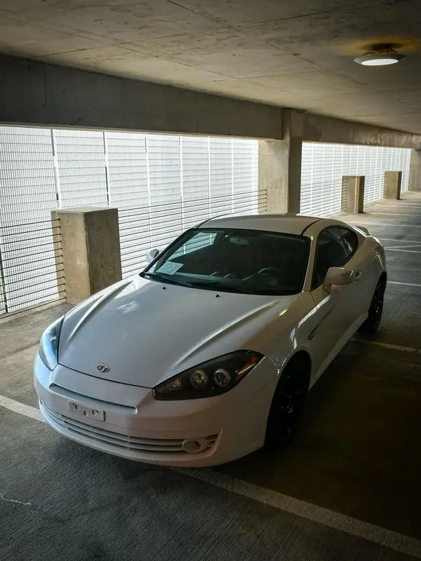 Hyundai Tiburon, parking garage: car photography by Izayuh Visuals in Sioux Falls, SD